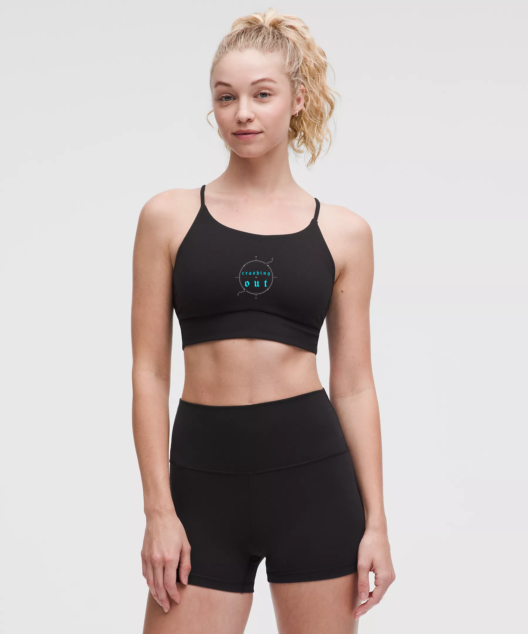 Crashing Out — Black strappy cami with blue crashing out compass emblem