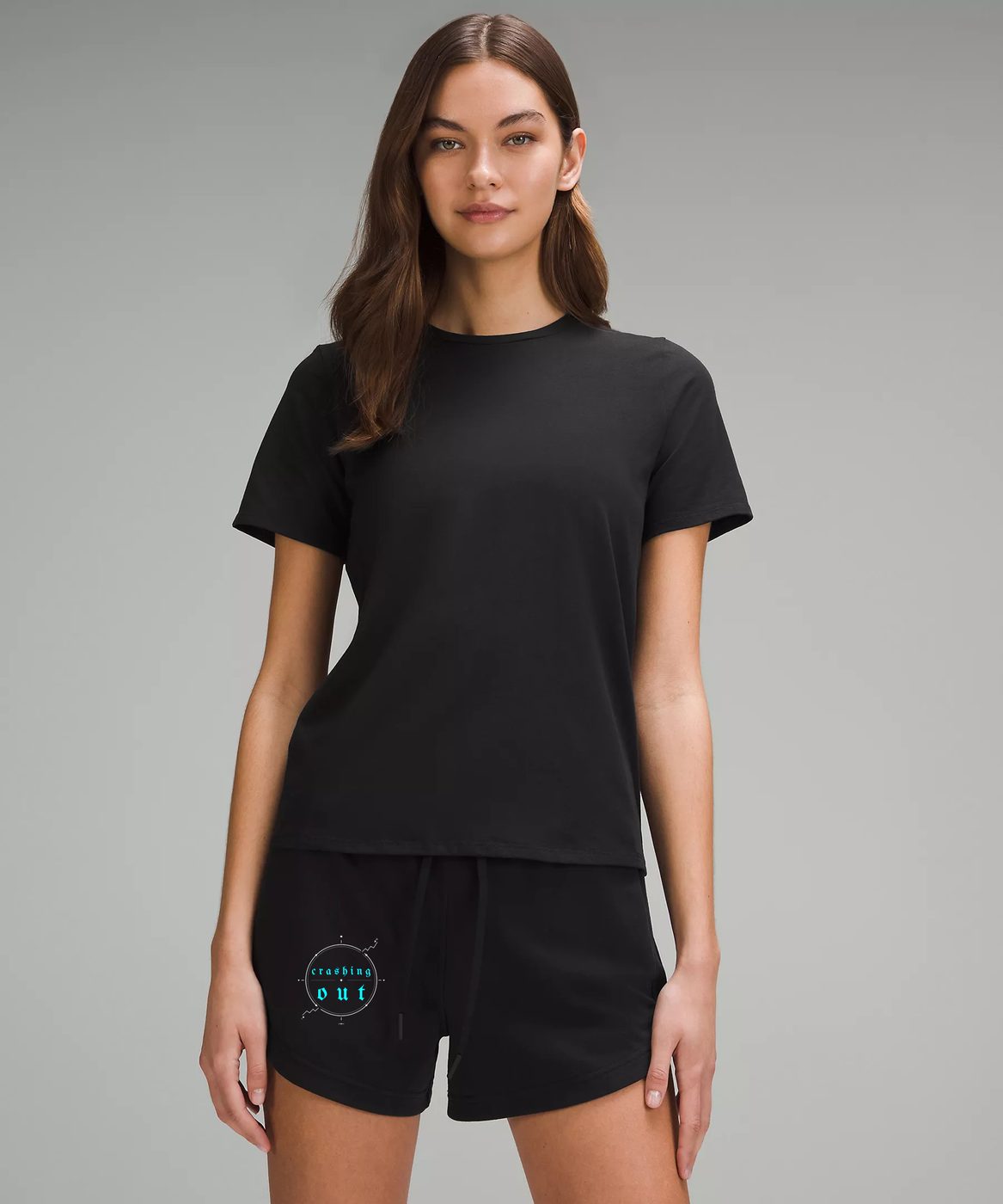 Crashing Out — Black shorts with blue crashing out emblem, worn with black tee